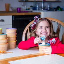 Set of ice cream bowls and spoons