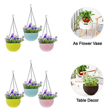 Decorative hanging flower pots with chains.