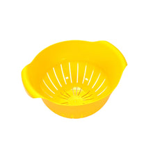 Plastic strainer bowl for easy fruit washing.