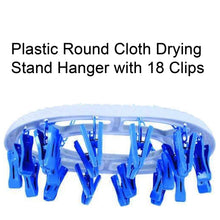 Plastic round drying stand with 18 strong clips for clothes.