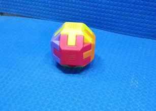 Activity cube with vibrant colors for children.